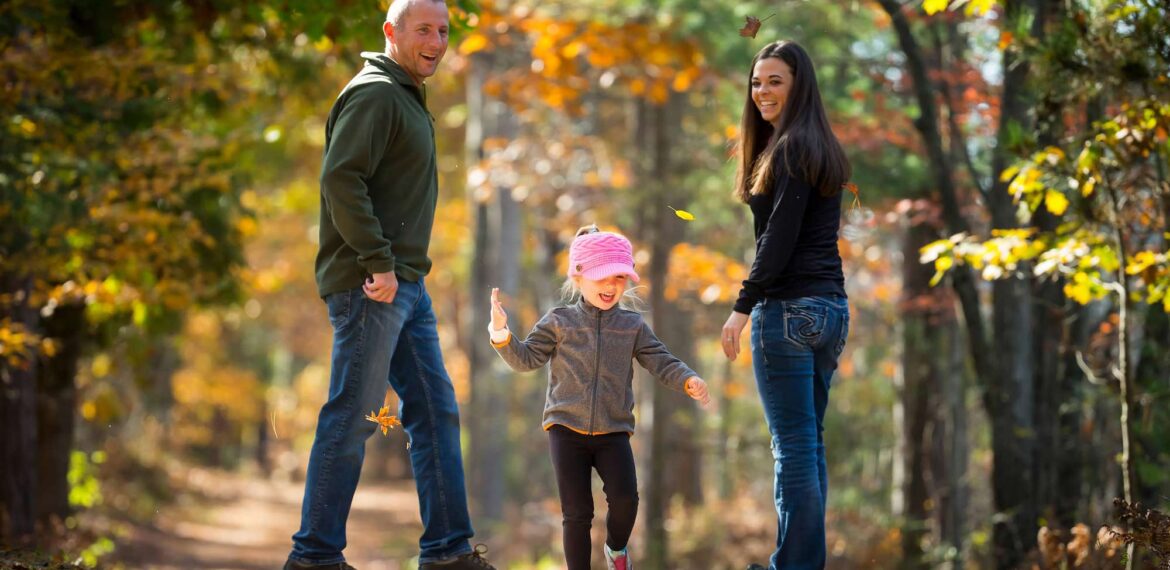 Family hiking in fall at Point Beach State Forest Two Rivers WI